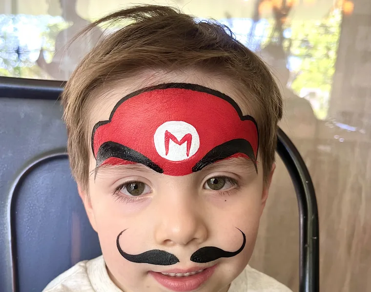 Pinta caritas Mario Bros Santiago