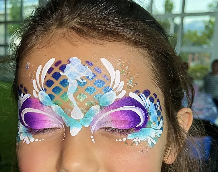 Pinta caritas sirena diseño de ojos Santiago